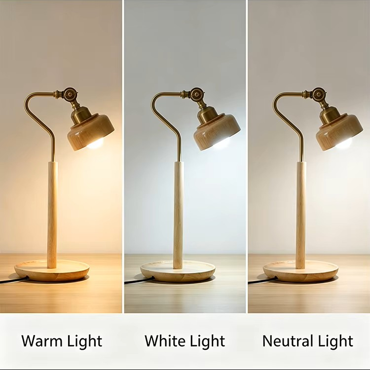 Three vertical panels show a table lamp in three lighting modes: Warm Light, White Light, and Neutral Light. The lamp has a light natural wood stand, a curved brass neck, and a conical shade.