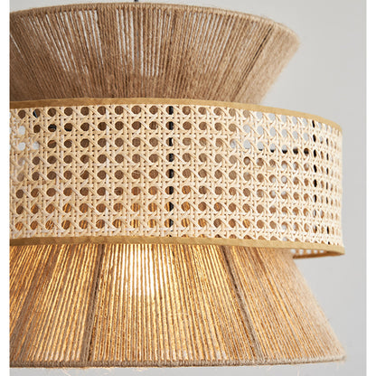 Architectural cane webbing pendant light combining tight rope wrapping and open-work wicker patterns for a textured look.