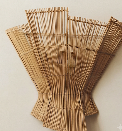 Biodegradable artisan rattan sculptural lamp for an organic, earth-friendly home.