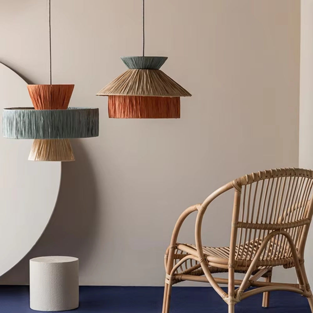 Colorful artisanal straw hanging lamps featuring unique geometric shapes