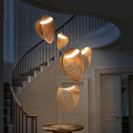 Artistic wave hanging lamp ideal for a dramatic staircase entryway