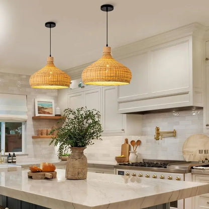 Bamboo dome pendant light casting a gentle glow over a modern kitchen island setup.