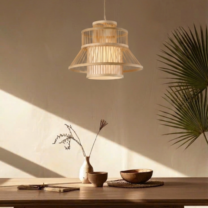 Bohemian style bamboo pendant light above a wooden dining table