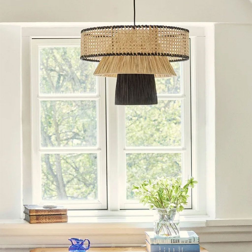 Bohemian style hanging light with intricate rattan shade