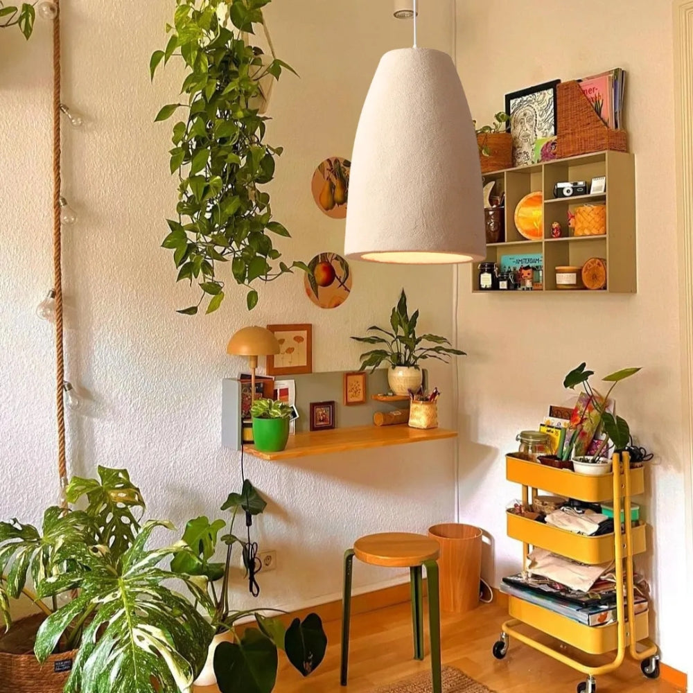 Boho ceramic cylinder hanging lights and vase-shaped lamps with textured finish for dining or living room.