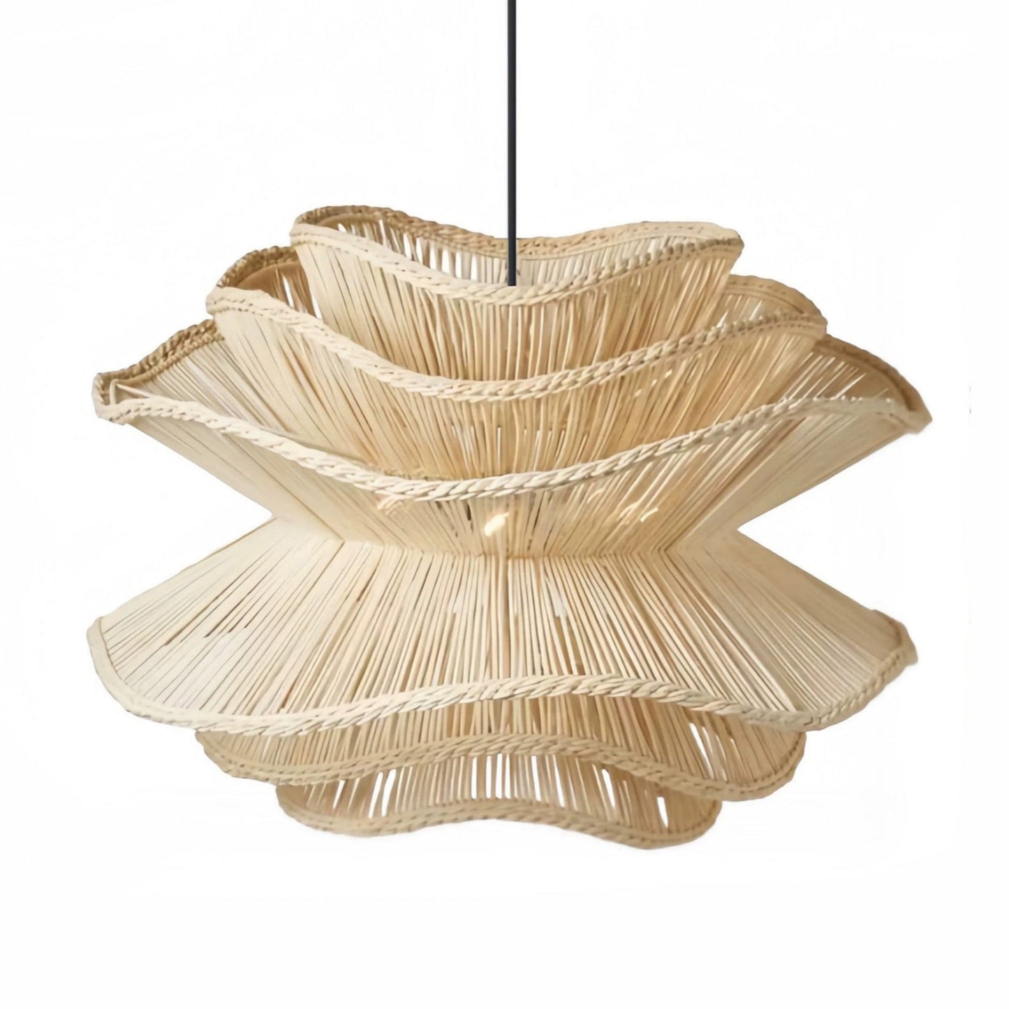 Close-up of the Alondra tiered rattan ceiling light fixture emphasizing its layered sculptural ruffles.