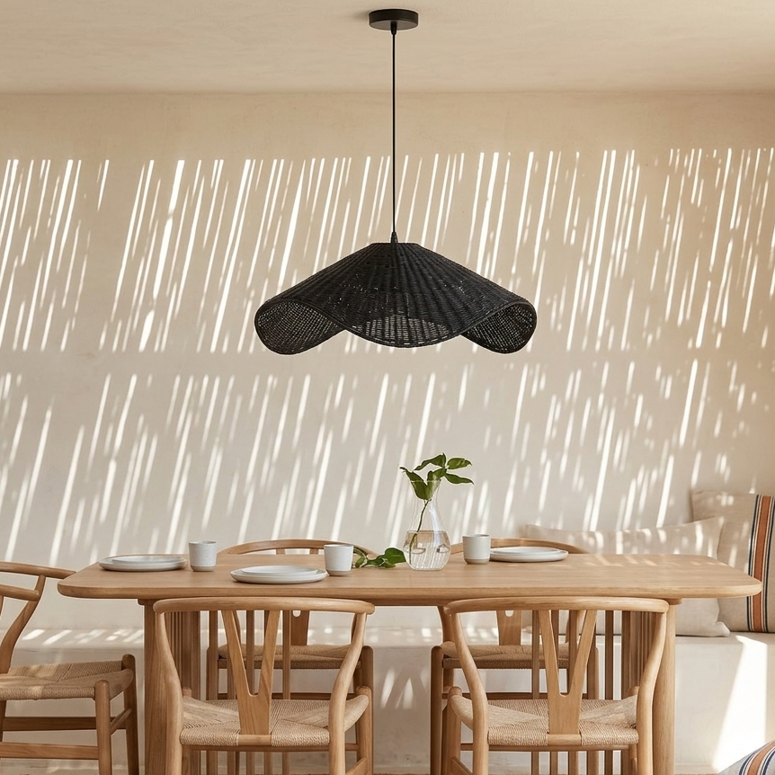 Bold black woven pendant light adding a sophisticated touch over dining tables