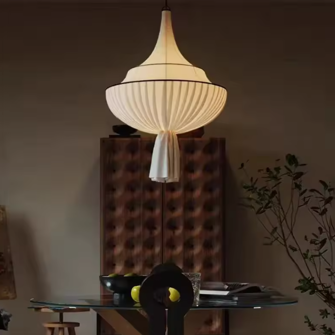 Ceiling pendant in Organic modern style, featuring Fabric material, perfect for Decor lighting, ideal for ambient and mood lighting.