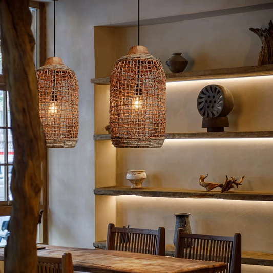 Ceiling pendant highlighting raw organic rattan cylinder materials for a minimalist earthy home aesthetic.