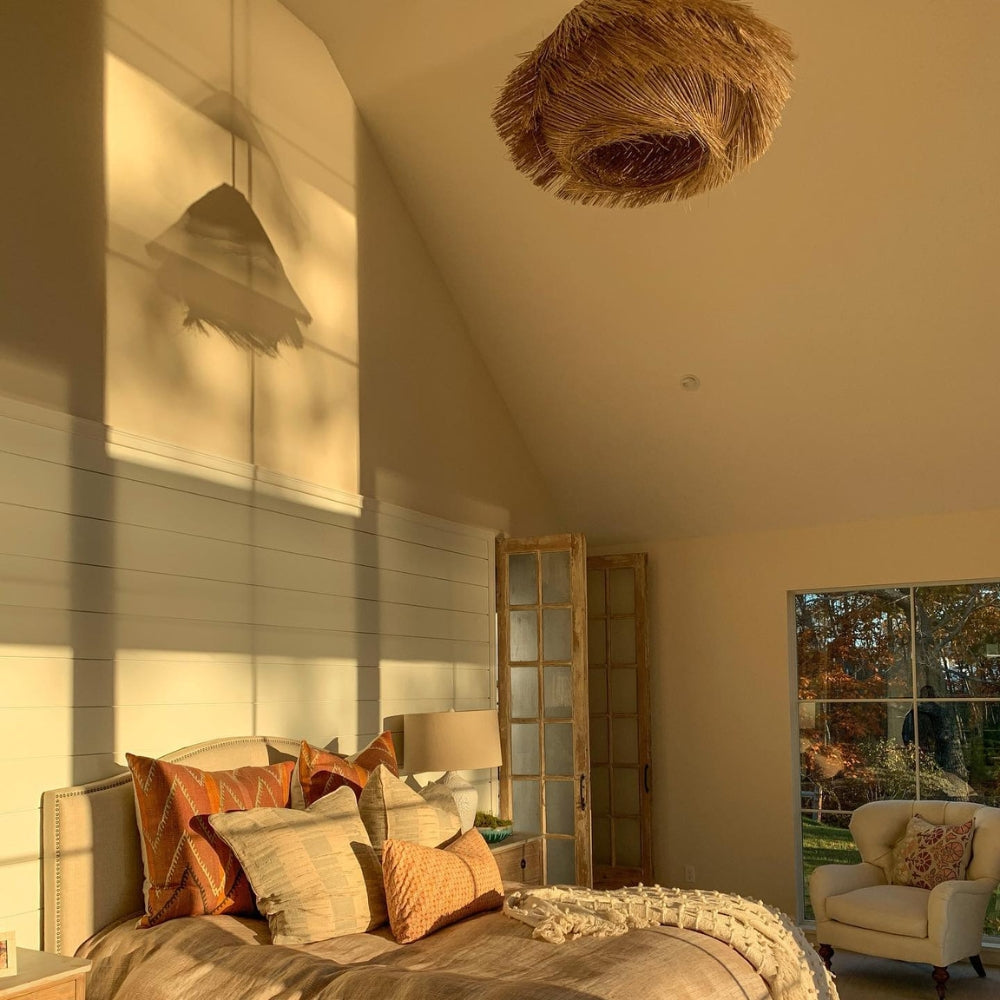 Coastal boho seagrass pendant shade showcasing messy tassel natural fibers for a beach house vibe.