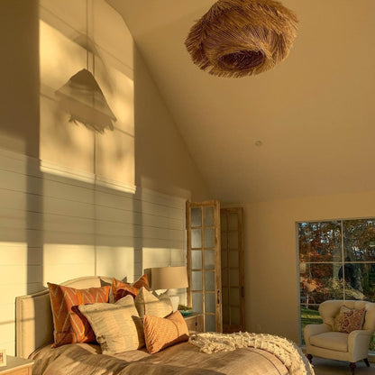 Coastal boho seagrass pendant shade showcasing messy tassel natural fibers for a beach house vibe.