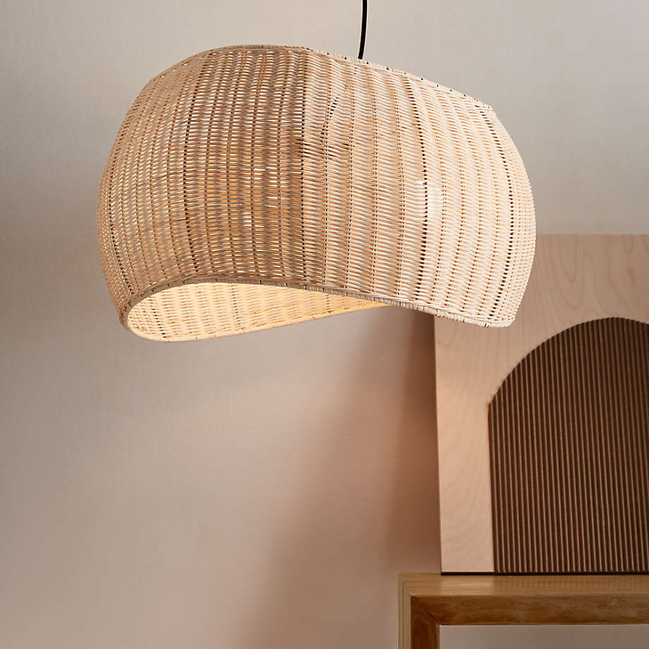 Contemporary artistic rattan pendant light featuring a unique modern oval shape