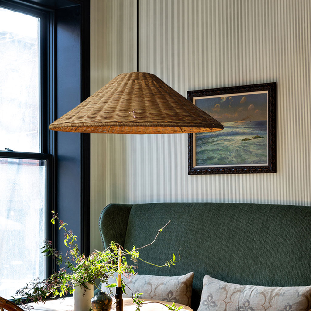 Cozy bedroom rattan cone light providing a glare-free, comforting ambient atmosphere perfect for a peaceful reading nook or bedside installation.