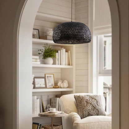 Dark bamboo dome pendant light providing cozy focus for a reading nook