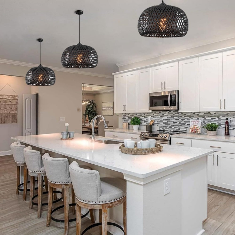 Dark bamboo pendant light hanging over a modern kitchen island