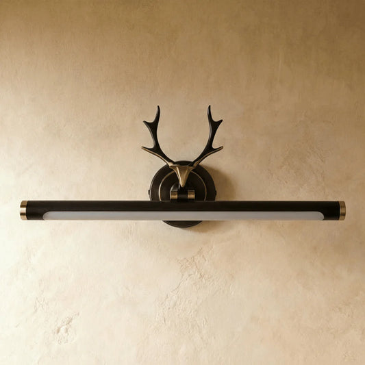 Decorative brass antler picture light for highlighting art gallery displays and fine wall decor