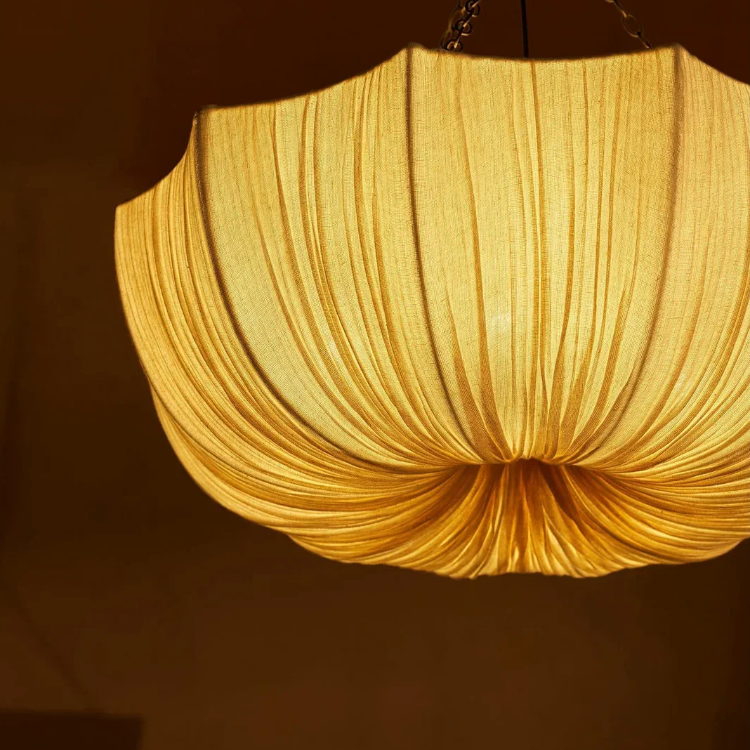 Drop light in Quiet luxury style, using Organic Fabric, creating beautiful sculptural lighting for your Home Decor.