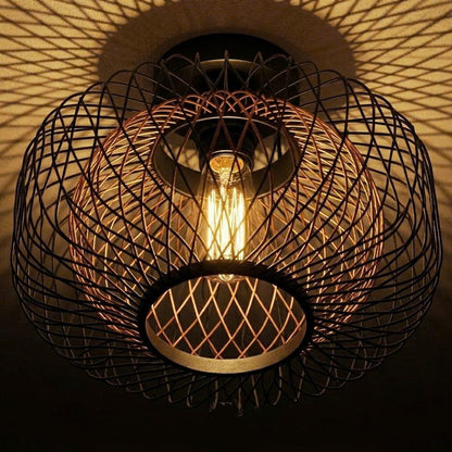 Sturdy steel wire cage flush mount lamp designed for modern industrial interiors.