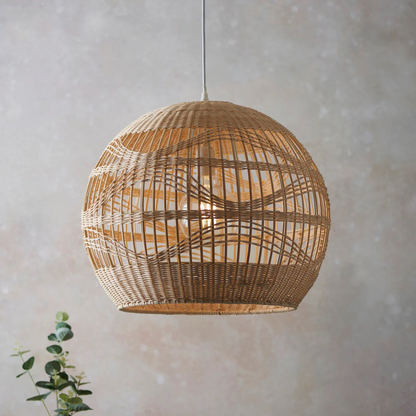 Eco-chic hand-wrapped rattan pendant, a sophisticated minimalist accent for sustainable interior styling.