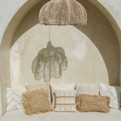 Sustainable earthy tan floating lamp shade highlighting its lightweight, see-through structure that diffuses glare-free illumination.