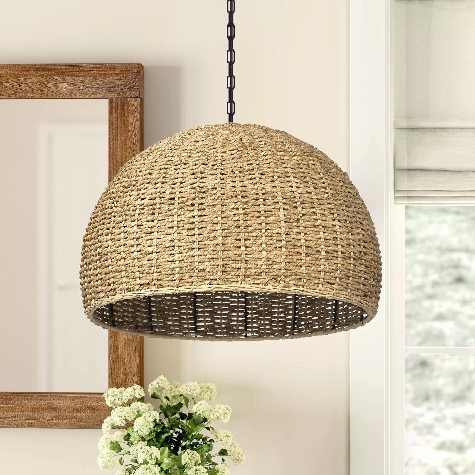 Hand-made sustainable seagrass chandelier with a timeless dome shape