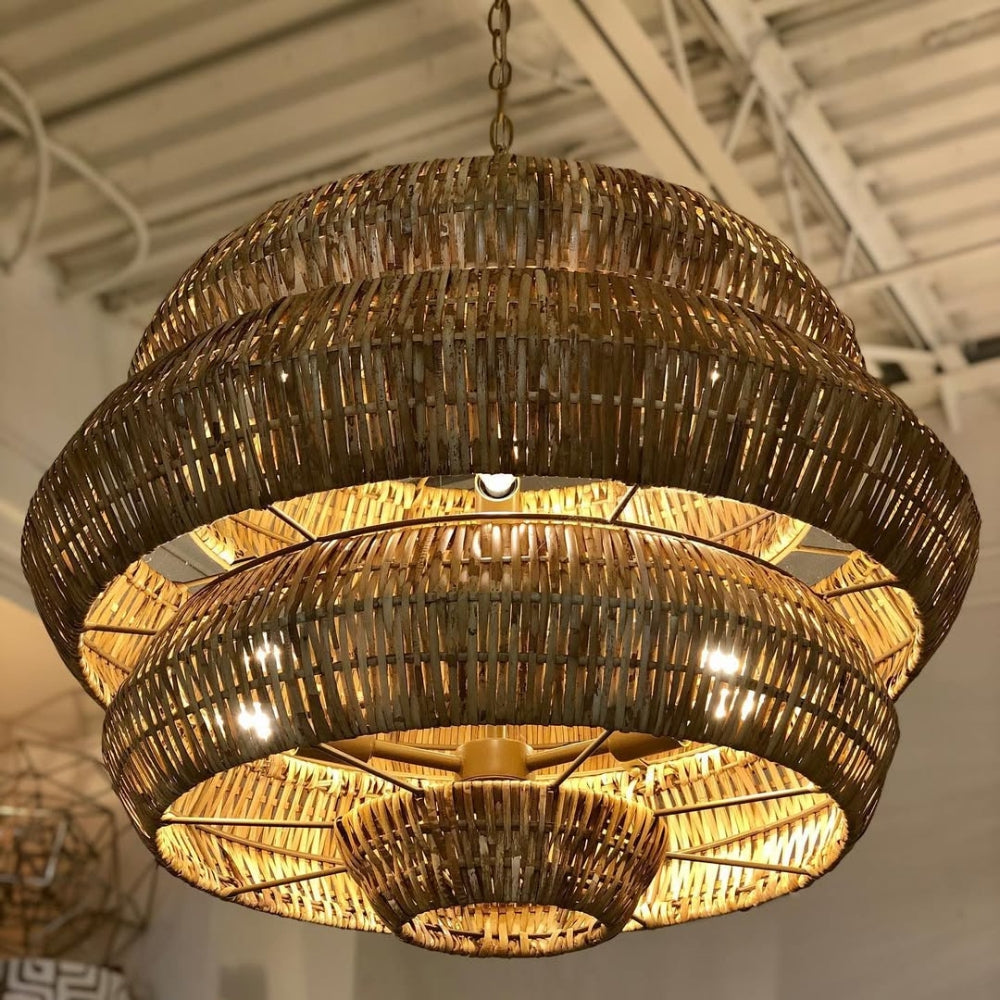 Artisan woven rattan basket lamp highlighting the raw texture and fine horizontal weave spacing of sustainable handcrafted organic fibers.