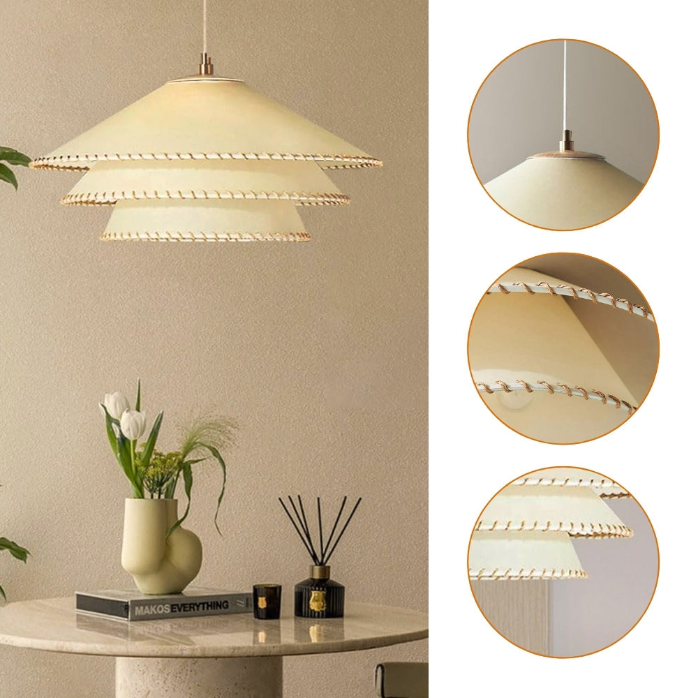 Handcrafted tiered fabric pendant light featuring beautiful decorative edge trim