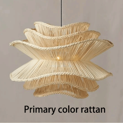 Eco-friendly natural fiber pendant lamp in a wavy, flower-like silhouette for coastal and boho decor.
