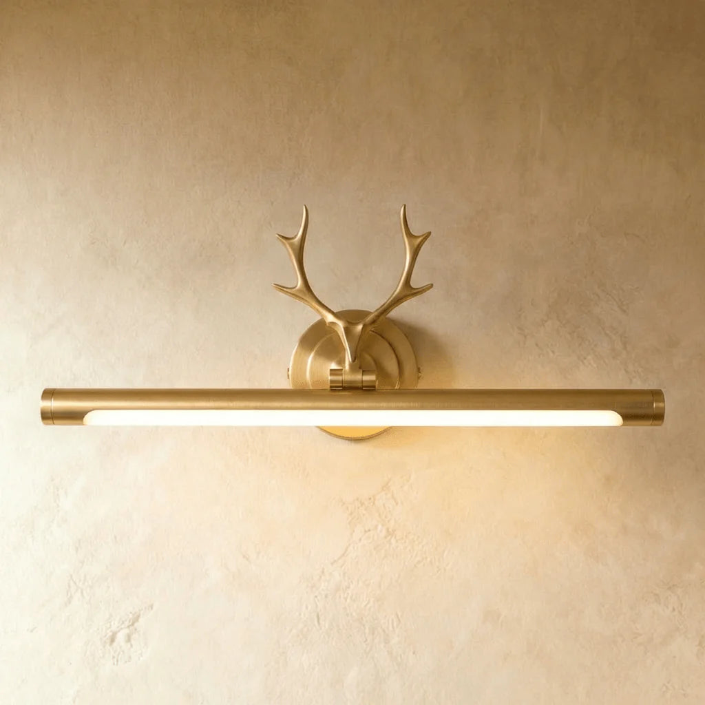 Handmade natural copper antler mirror sconce for a cozy, eco-friendly reading corner