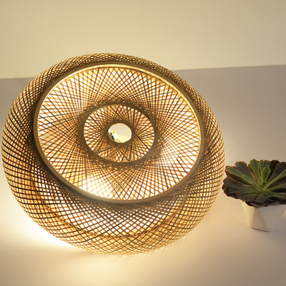  Artisan handwoven bamboo mesh pendant light showcasing exquisite traditional craftsmanship and clean lines.