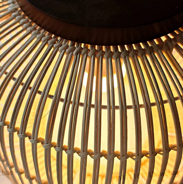 Artisan crafted rattan chandelier showcasing traditional vertical cane slat weaving in natural beige tone.