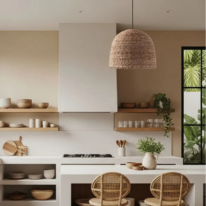 Rustic handwoven wicker pendant light hanging over a kitchen island