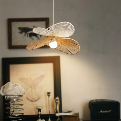 Handwoven natural hemp petal pendant light above dining table