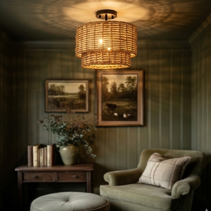 Handwoven natural seagrass tiered ceiling light with rustic texture and a sleek black metallic mount.