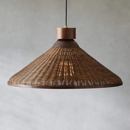 Handwoven rattan and wood mesh pendant lamp featuring detailed artisan fiber craftsmanship.