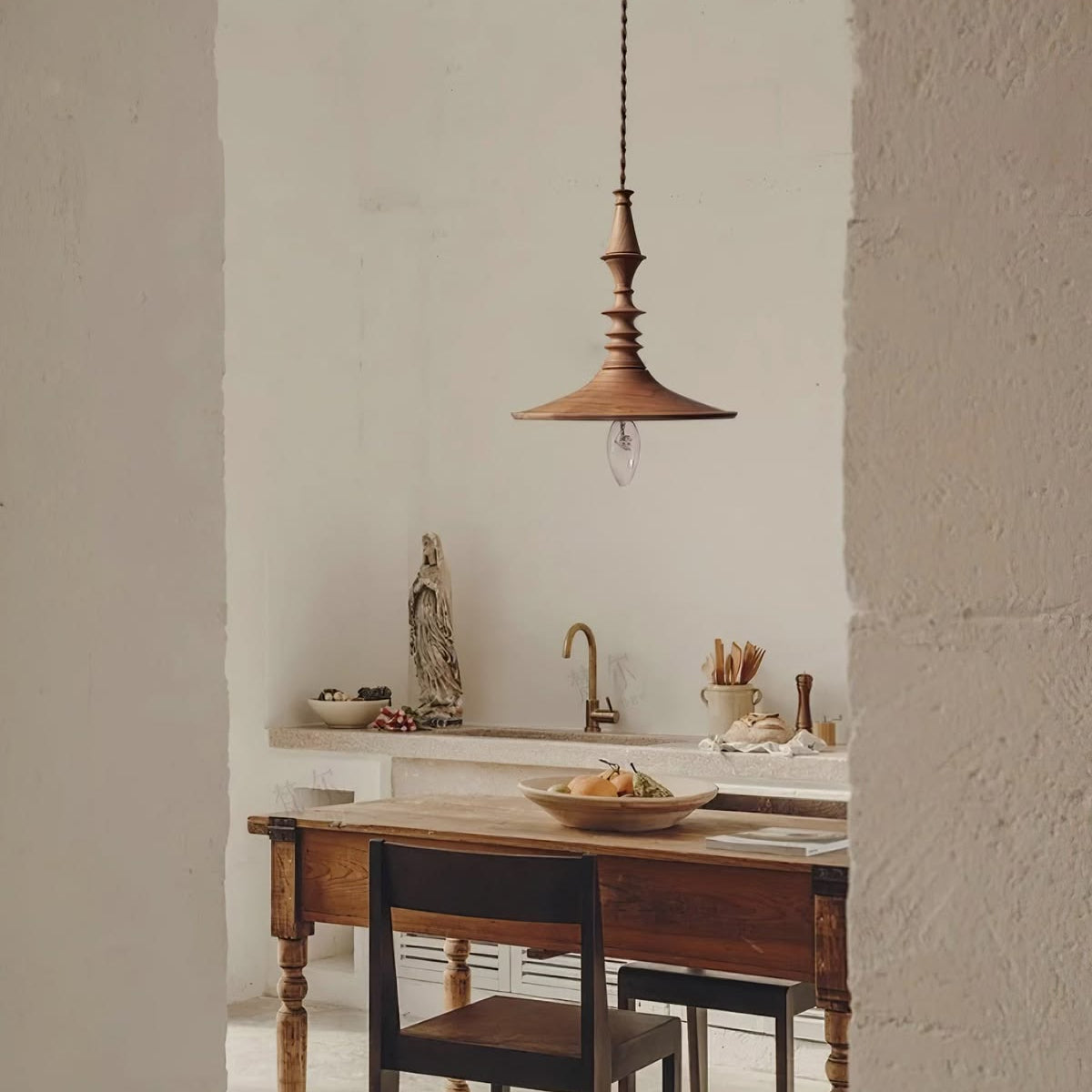 Hanging lamp in modern turned wood style, perfect for dining table lighting, offering beautiful accent light.