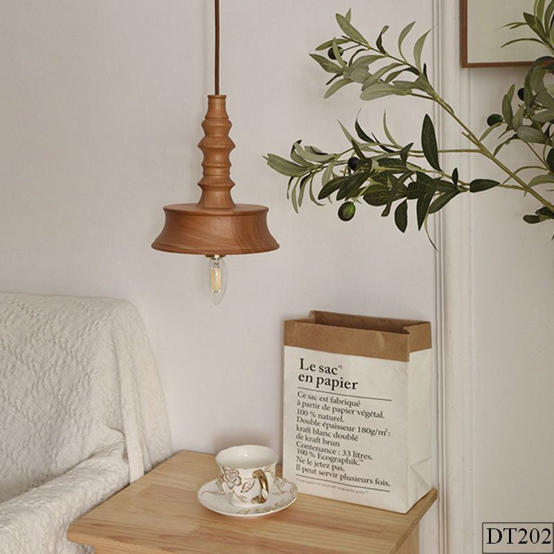 Hanging lamp in Modernism style, featuring turned wood material, creating a sleek, textured look for interior decor.