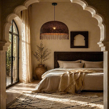 Non-allergenic hanging lamp made with natural rattan weave, perfect for a holistic bedroom sanctuary.