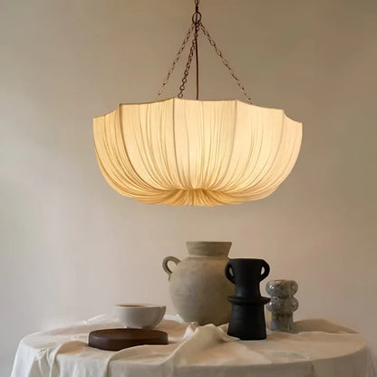 Hanging lamp with Organic modern aesthetic, made from Textile, ideal Art room lamp for ambient and task lighting.