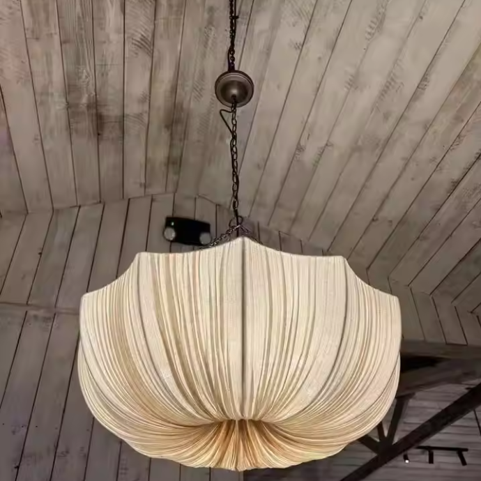 Hanging lamp with Organic modern aesthetic, made from Textile, ideal Bedroom lamp for ambient and task lighting.
