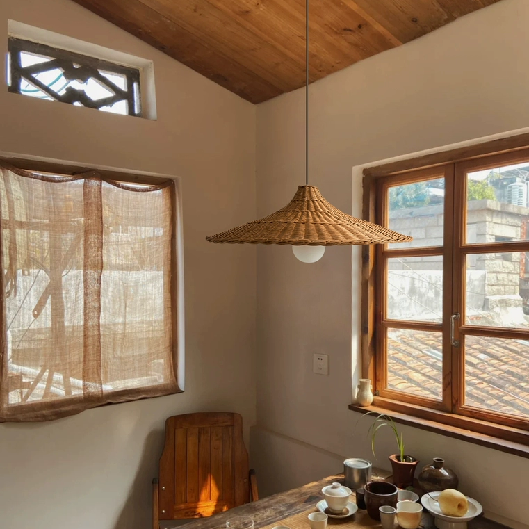 Zero-waste hanging lamp made of pure natural bamboo, grounding the mood of a private wine cellar.