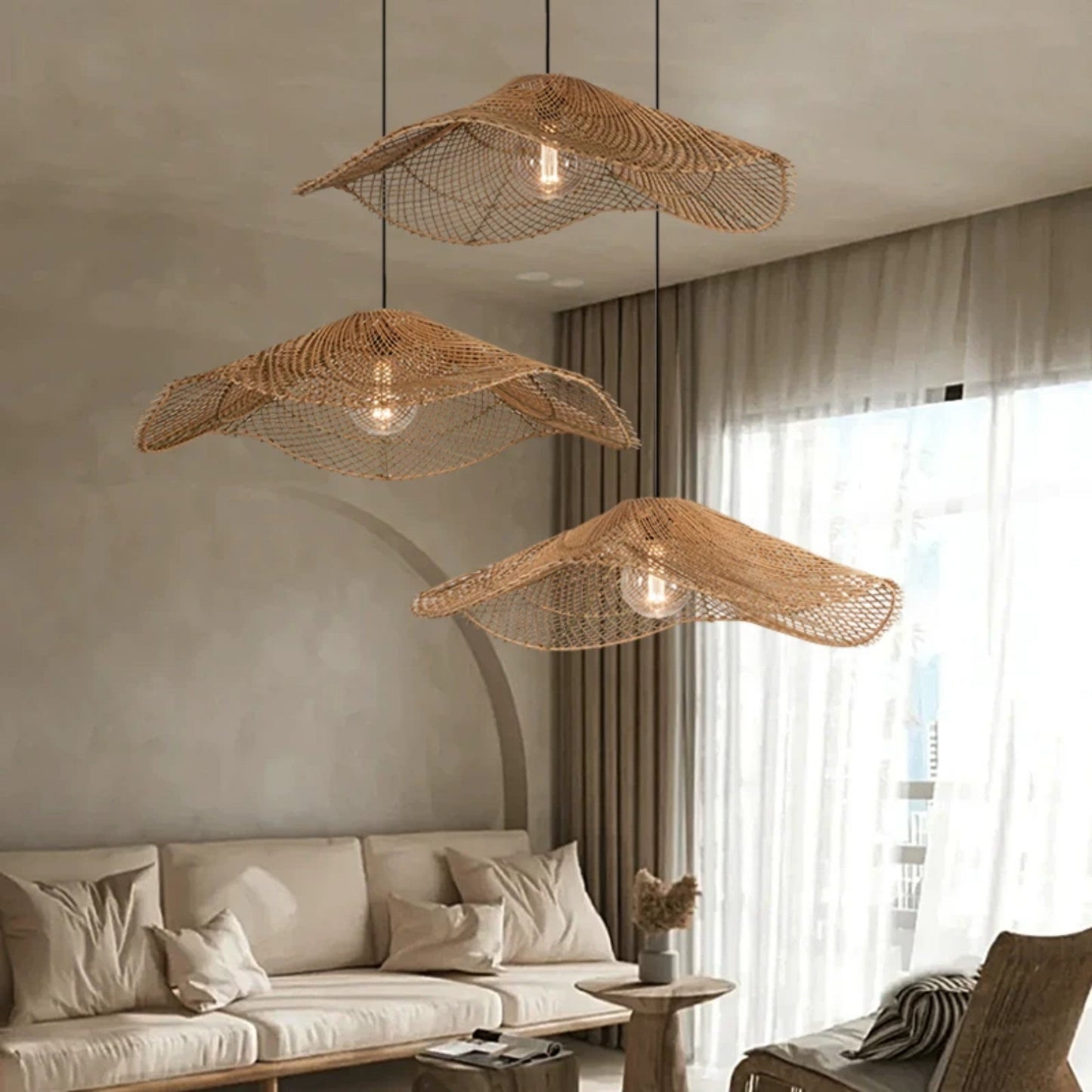 Premium bamboo wave light shade bringing a touch of sustainable organic luxury to a high-end restaurant or boutique hotel dining space.