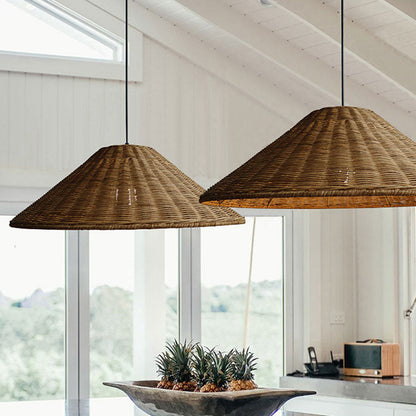 Minimalist natural fiber cluster ceiling fitting styled in a warm neutral interior alongside a fluted sideboard cabinet and cane chair.