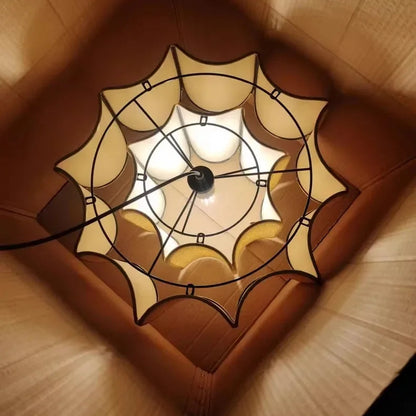 Modern Japandi sculptural pendant light, rattan finish for minimalist rooms, tiered frame.