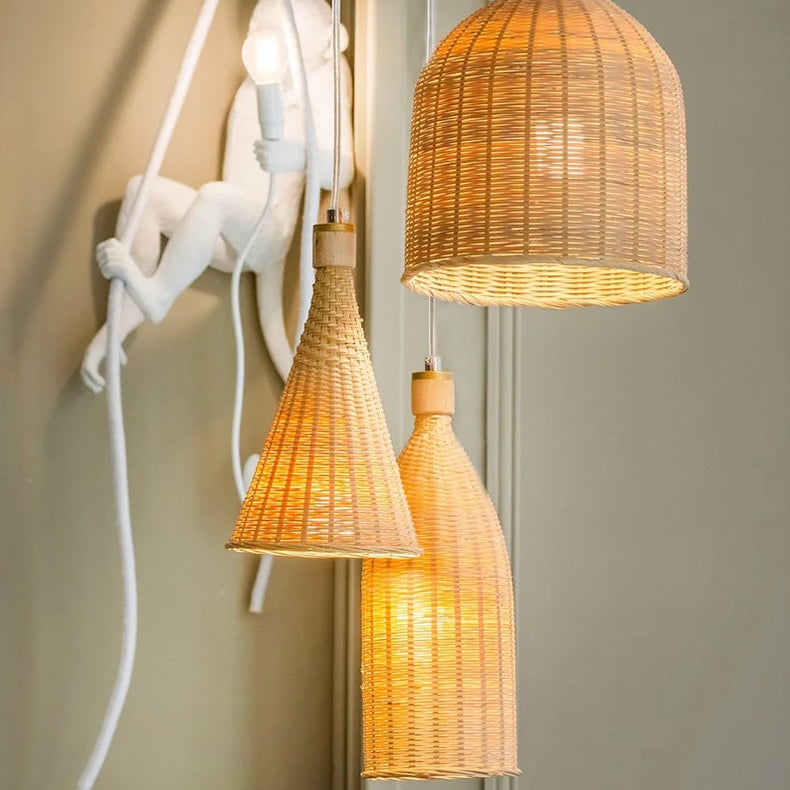 Premium woven eclectic shapes chandelier combining different artisan woven baskets into a luxurious statement light.