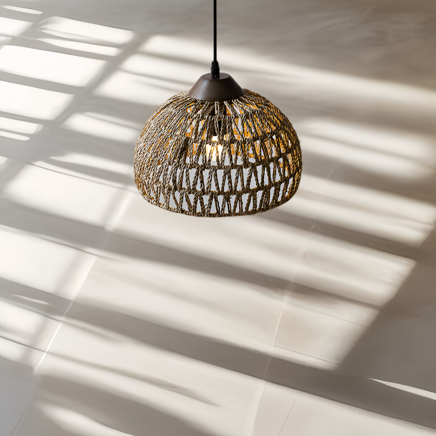 Mid-century inspired seagrass bowl lamp, combining retro texture with a clean and modern design form.