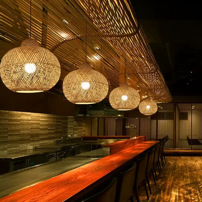 Stylish bar counter pendant, natural bamboo weave for modern lounge lighting, sphere shape.