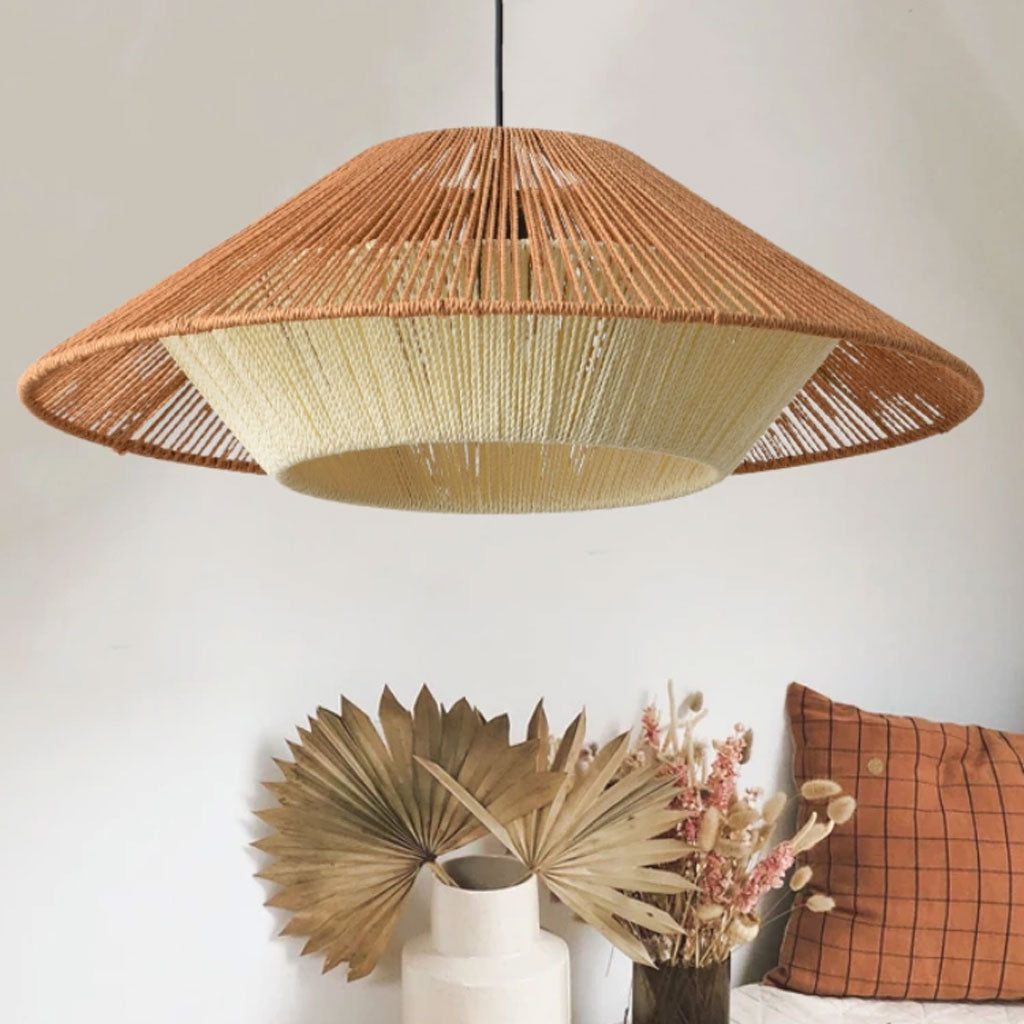Minimalist dual-layer bamboo pendant lamp hanging from a sleek black cord and matching round ceiling canopy.