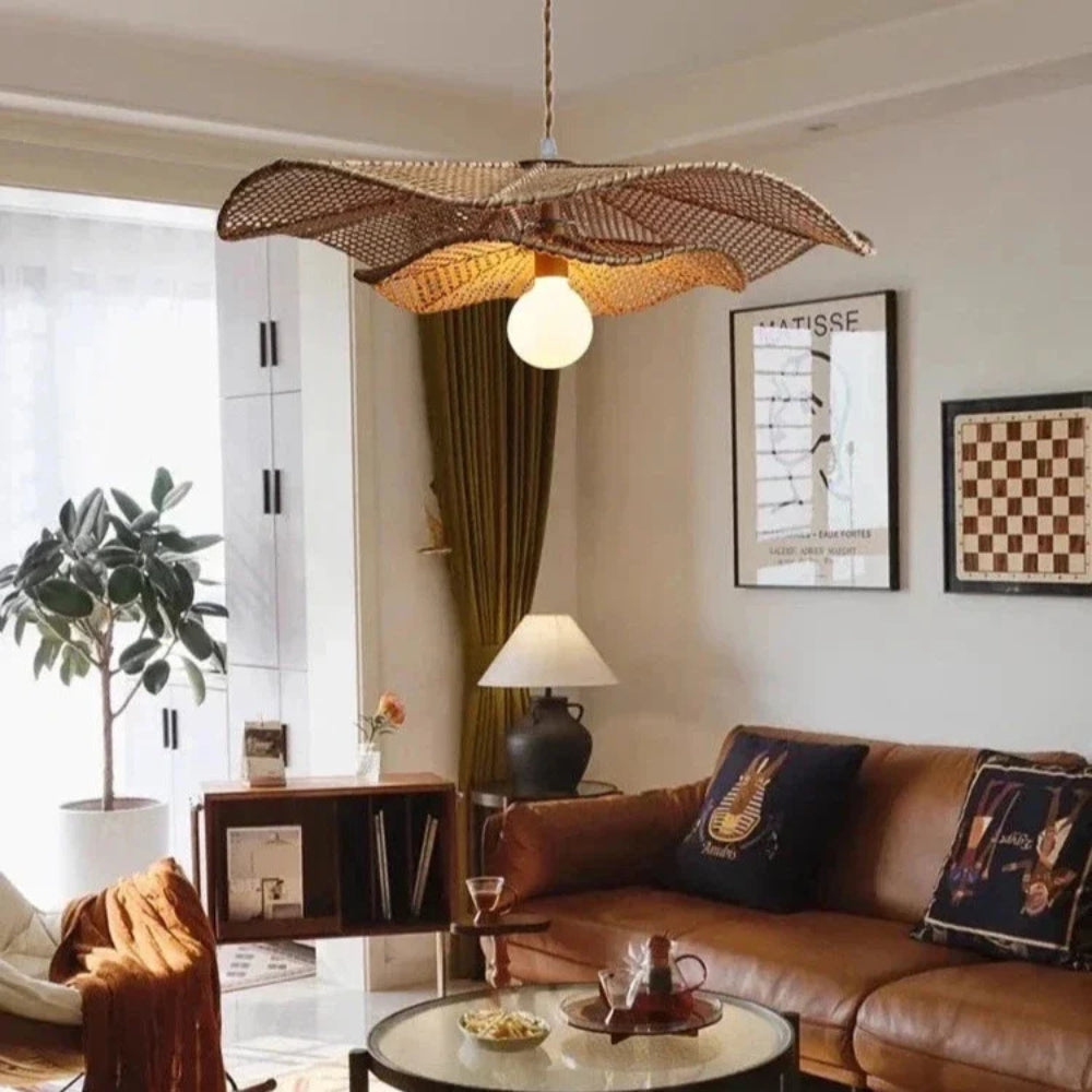 Minimalist natural rattan pendant light with a rustic petal-style silhouette