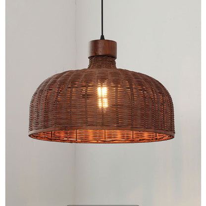 Minimalist rattan drum hanging lamp suspended by a sleek black cord with a luxurious brass and wood canopy detail.